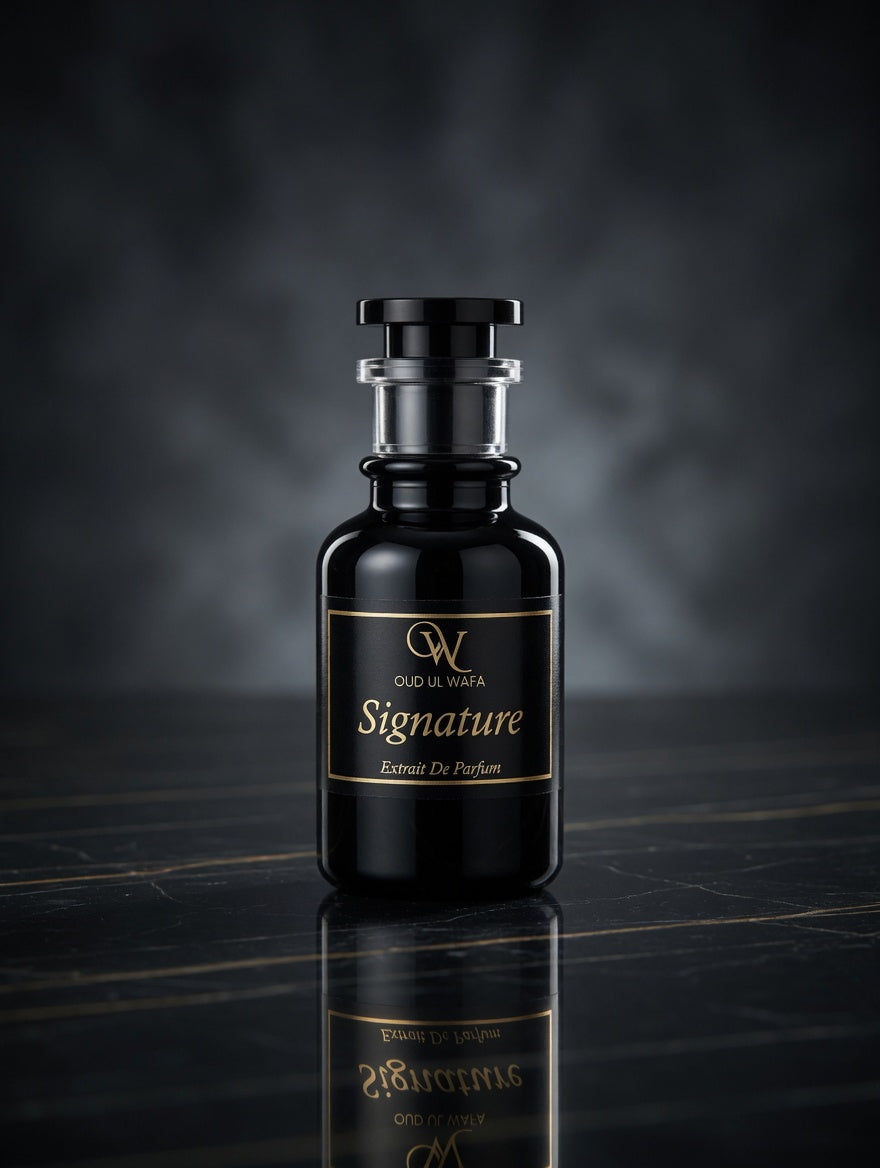 Black perfume bottle with gold label on a reflective surface and dark background